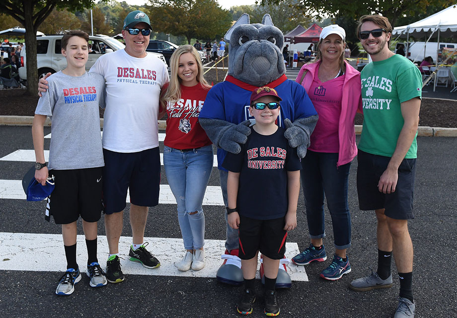 Family standing with Frankie