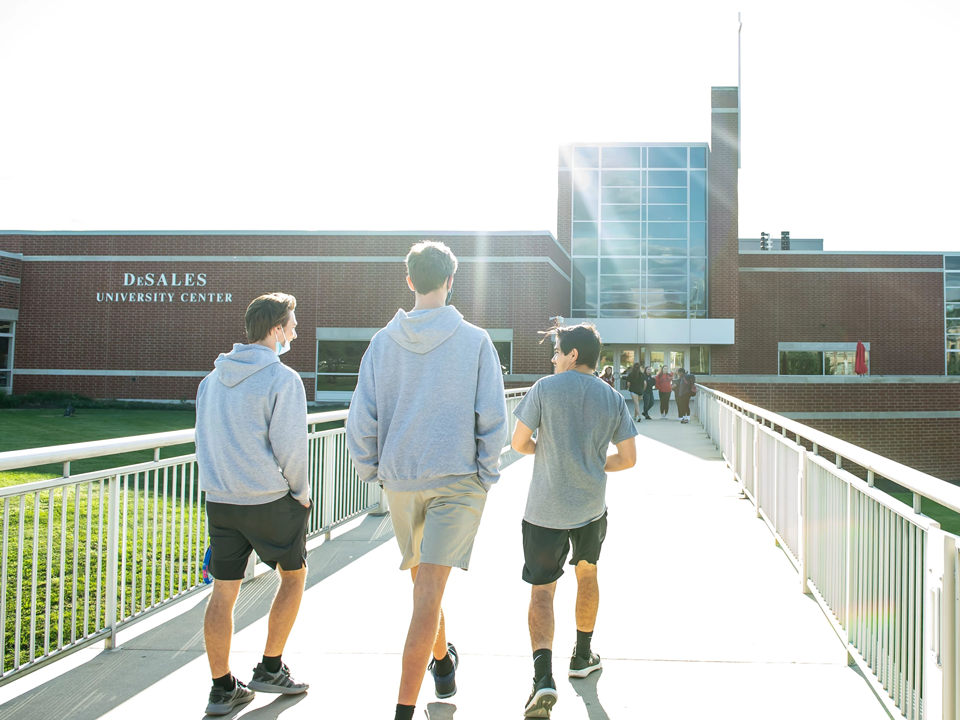 students walking on campus