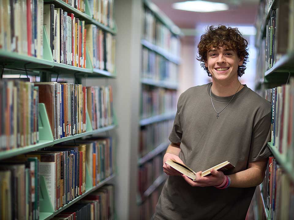 student with a book