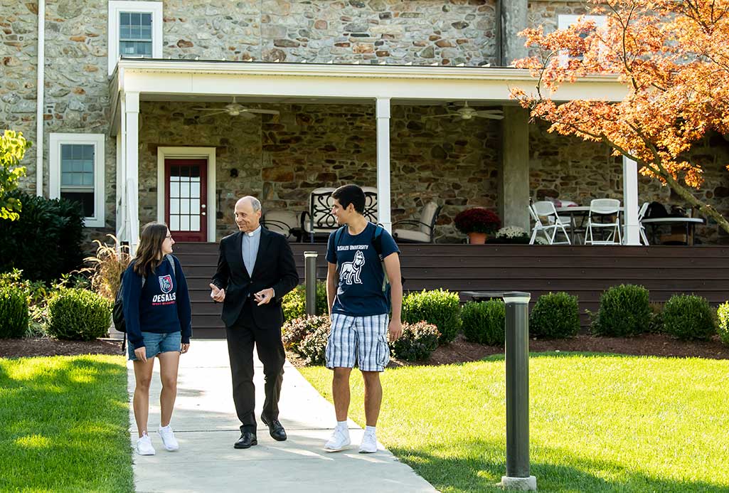 father jim talking to students