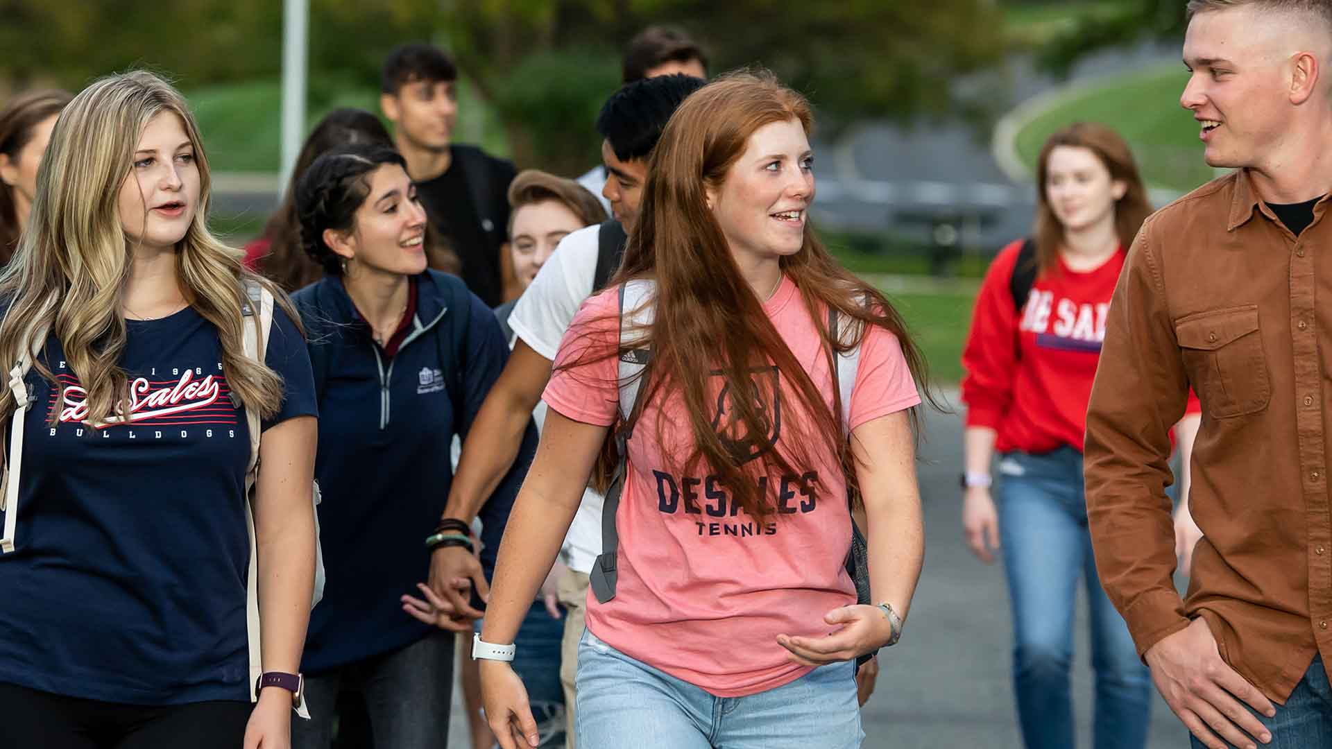 group of students walking on campus
