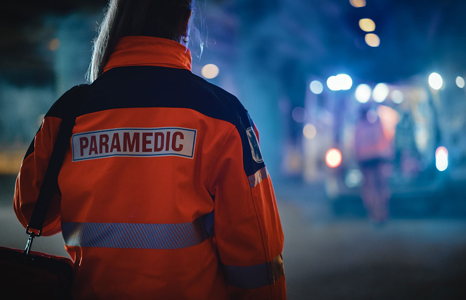 paramedic standing near an emergency scene