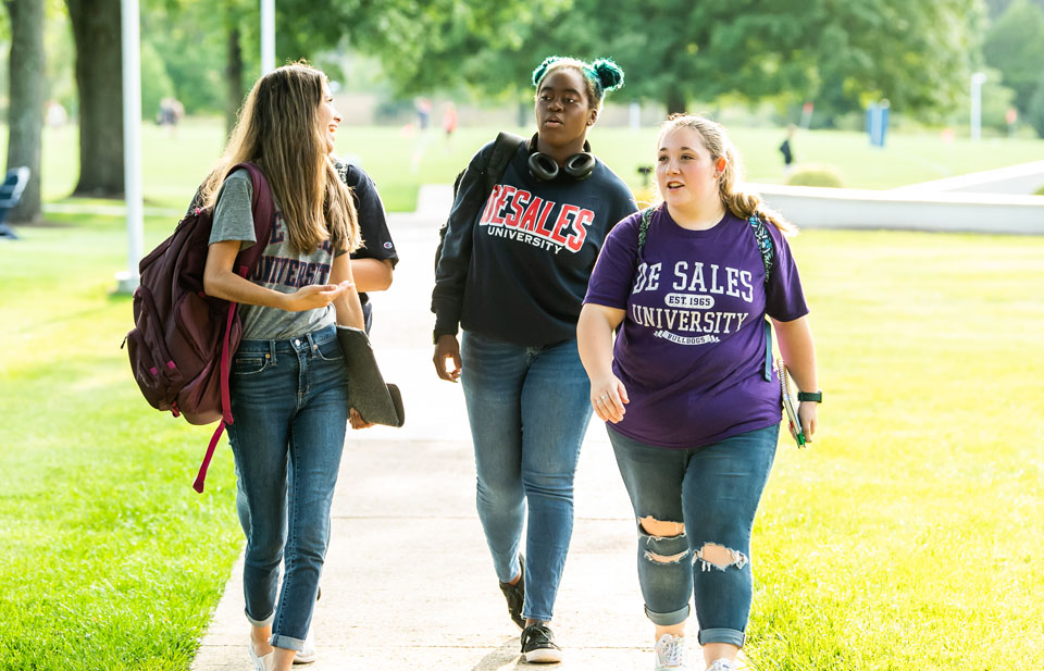 students walking together on campus