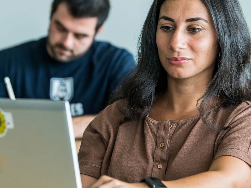 girl looking at a computer