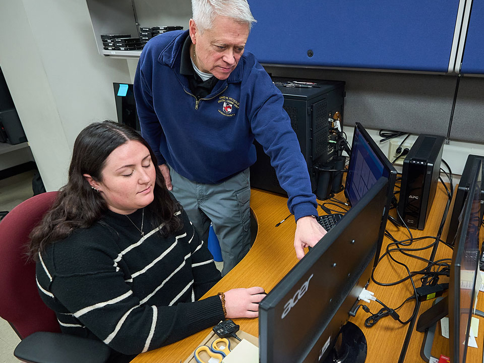 student looking at a computer