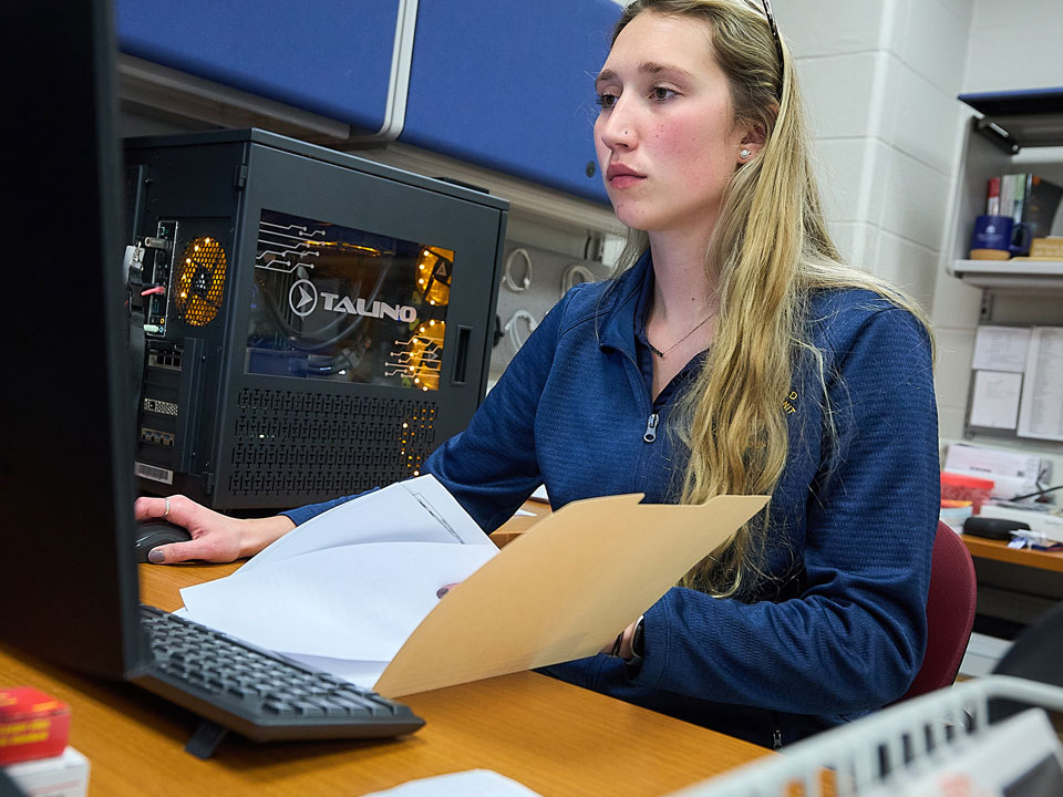 girl looking at a file