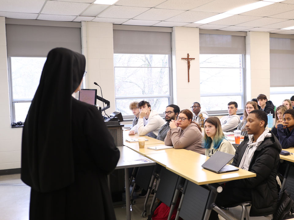 nun teaching a class