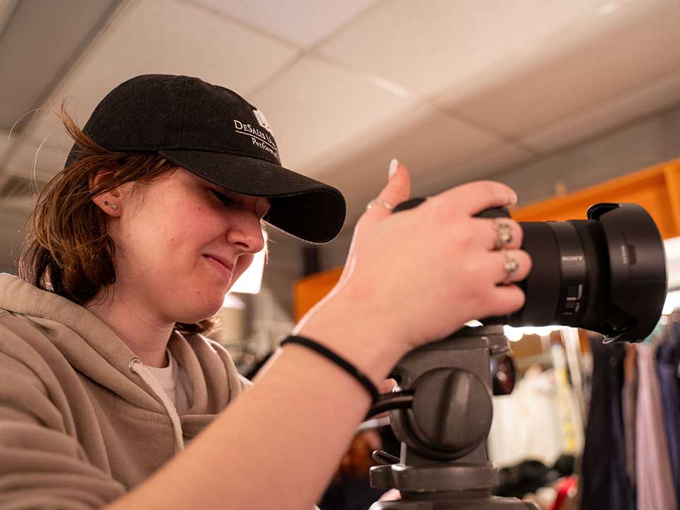 student using a camera