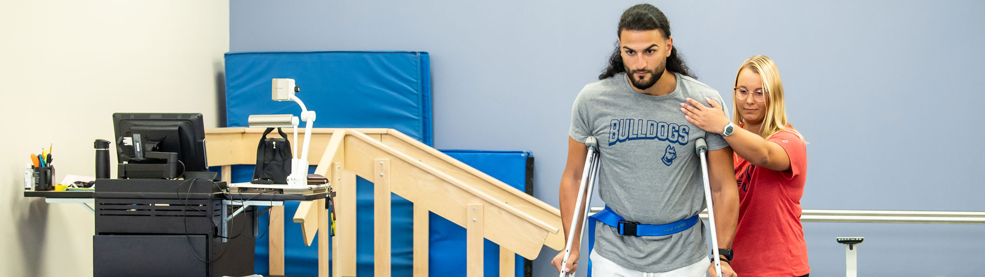 students working in a physical therapy clinic