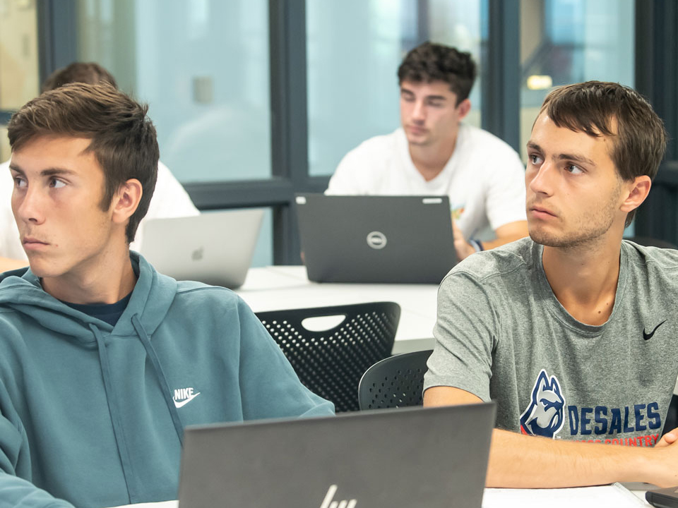 students looking at a computer