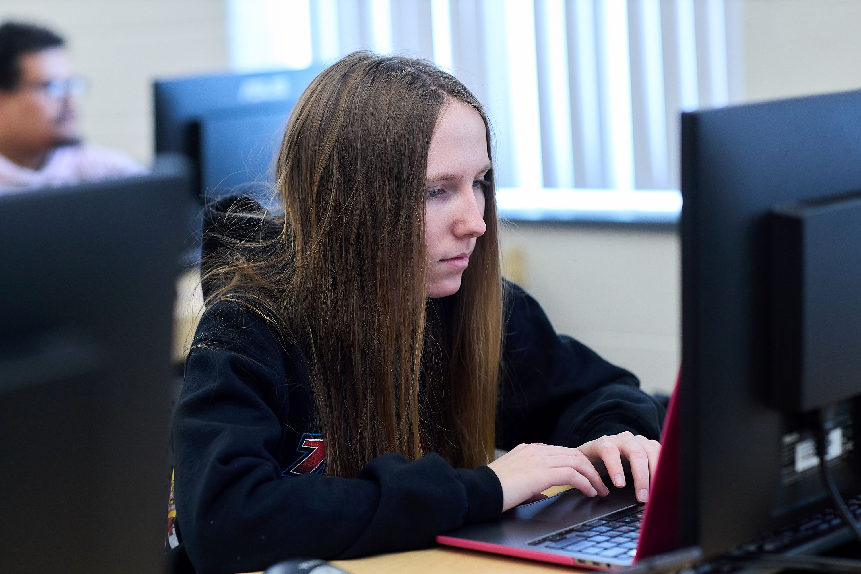 student in forensics lab