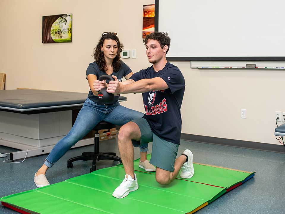 students working in physical therapy lab