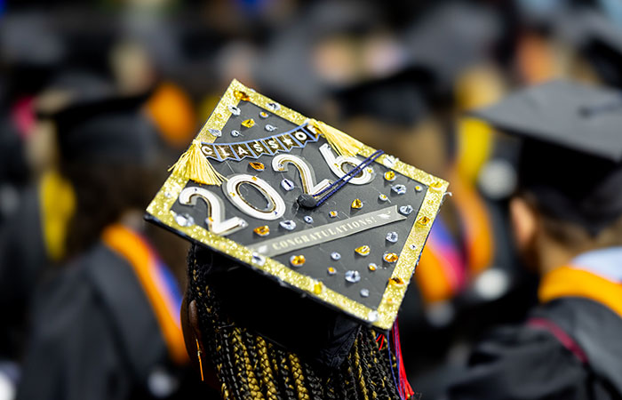 decorated graduation cap at commencement ceremony