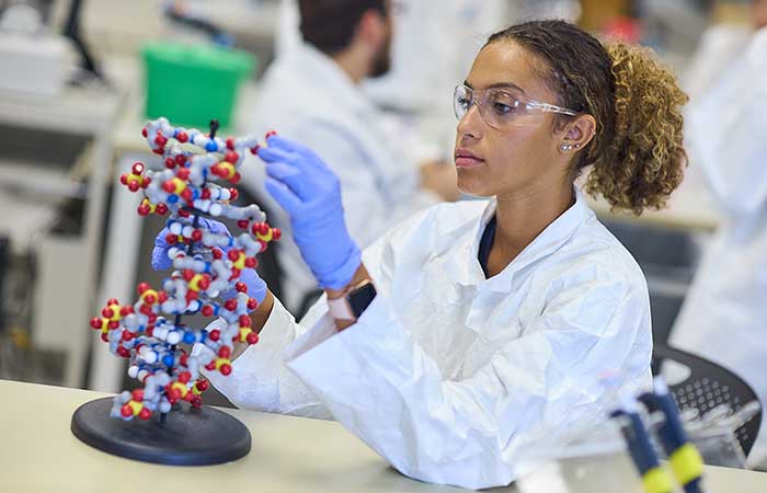 female student in a science lab