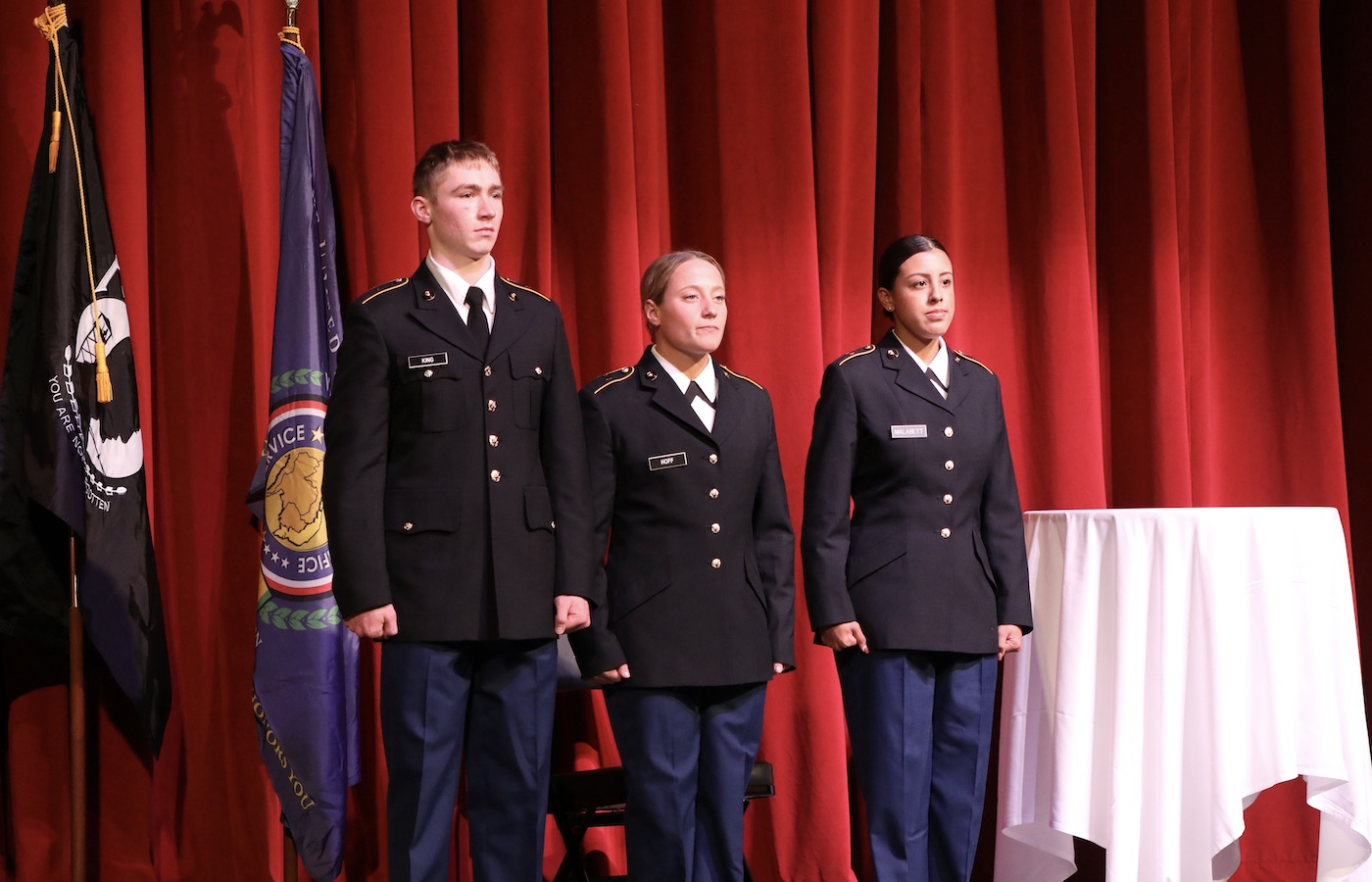 Allison Hoff ’23, M’25, center, with Nathan Hugaboom ’27 and Valery Malabett ’25 at DeSales University’s Veterans Day ceremony. 