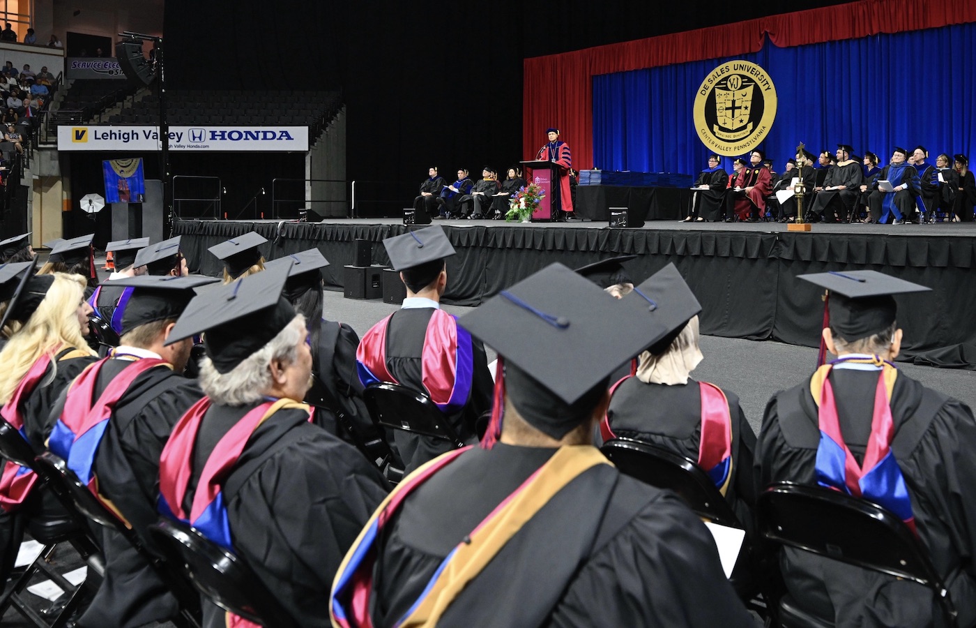 Father Greenfield speaking at Commencement