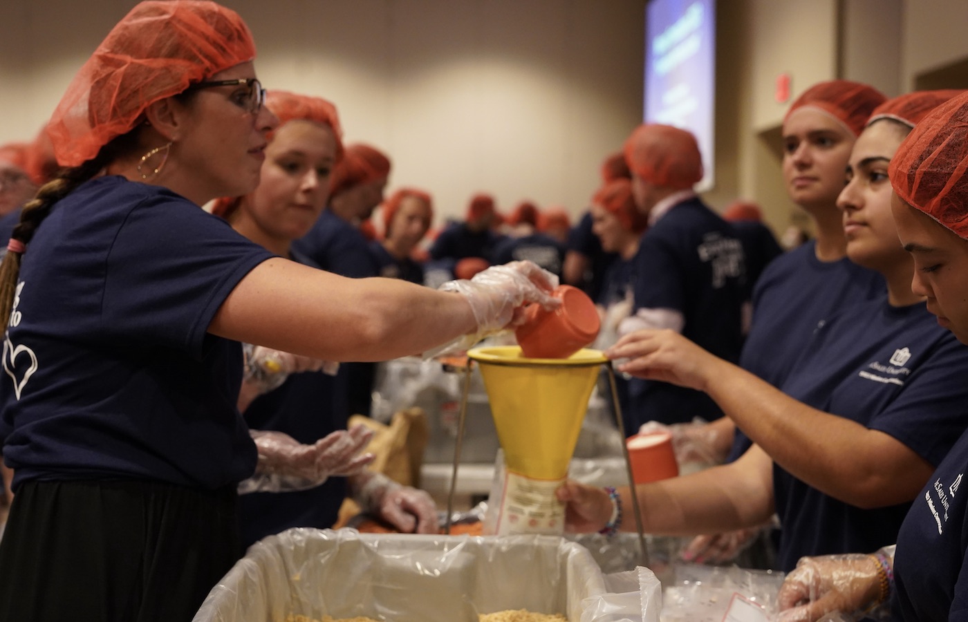 DeSales community making rice bags