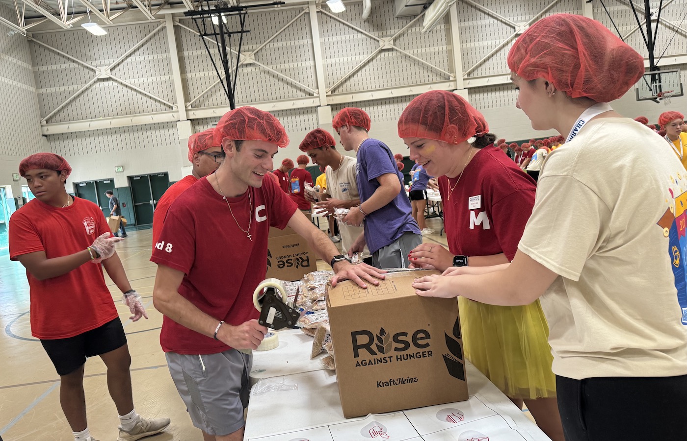 Students volunteering to make rice bags