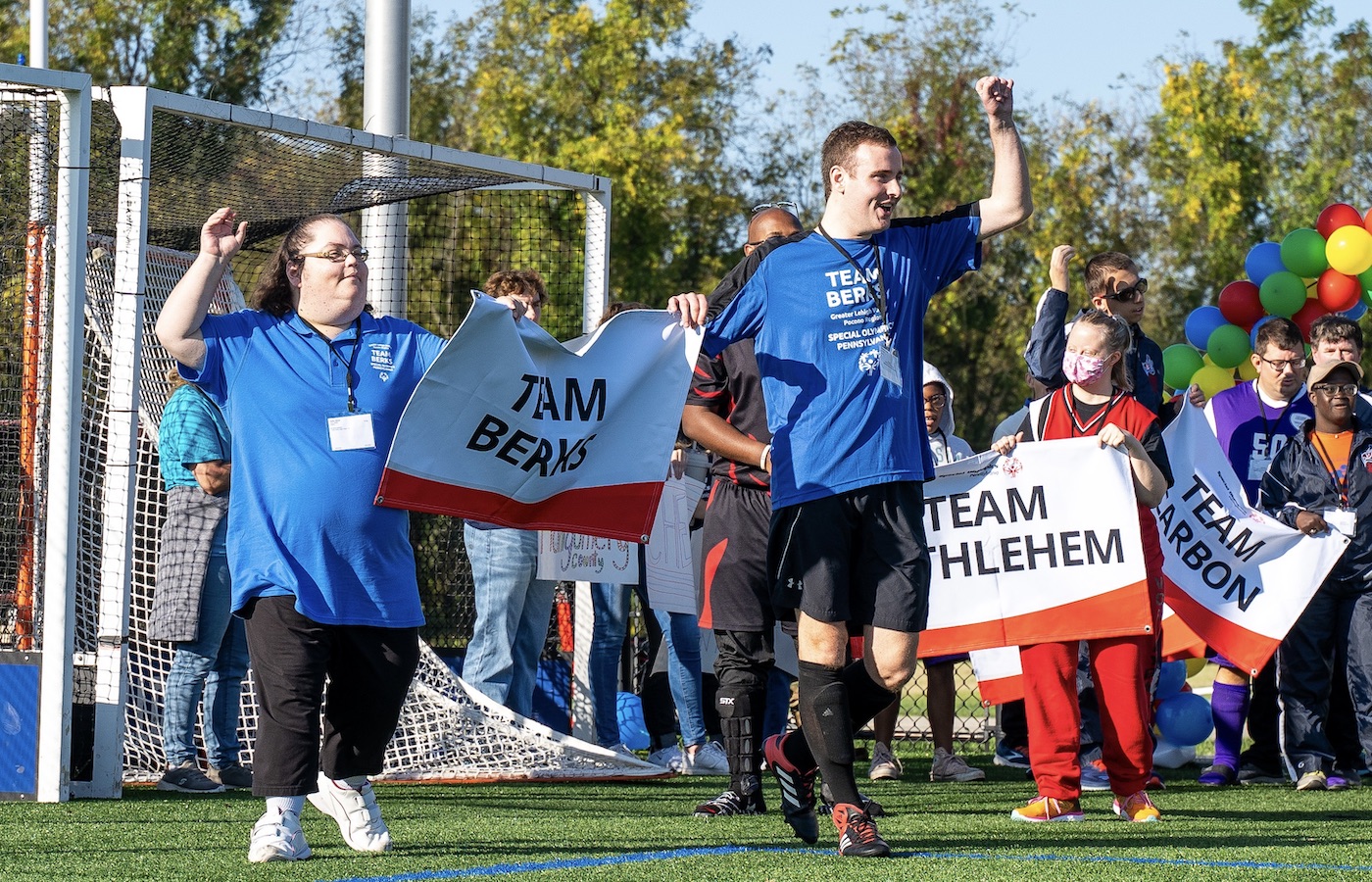 Crowd cheering at Special Olympics